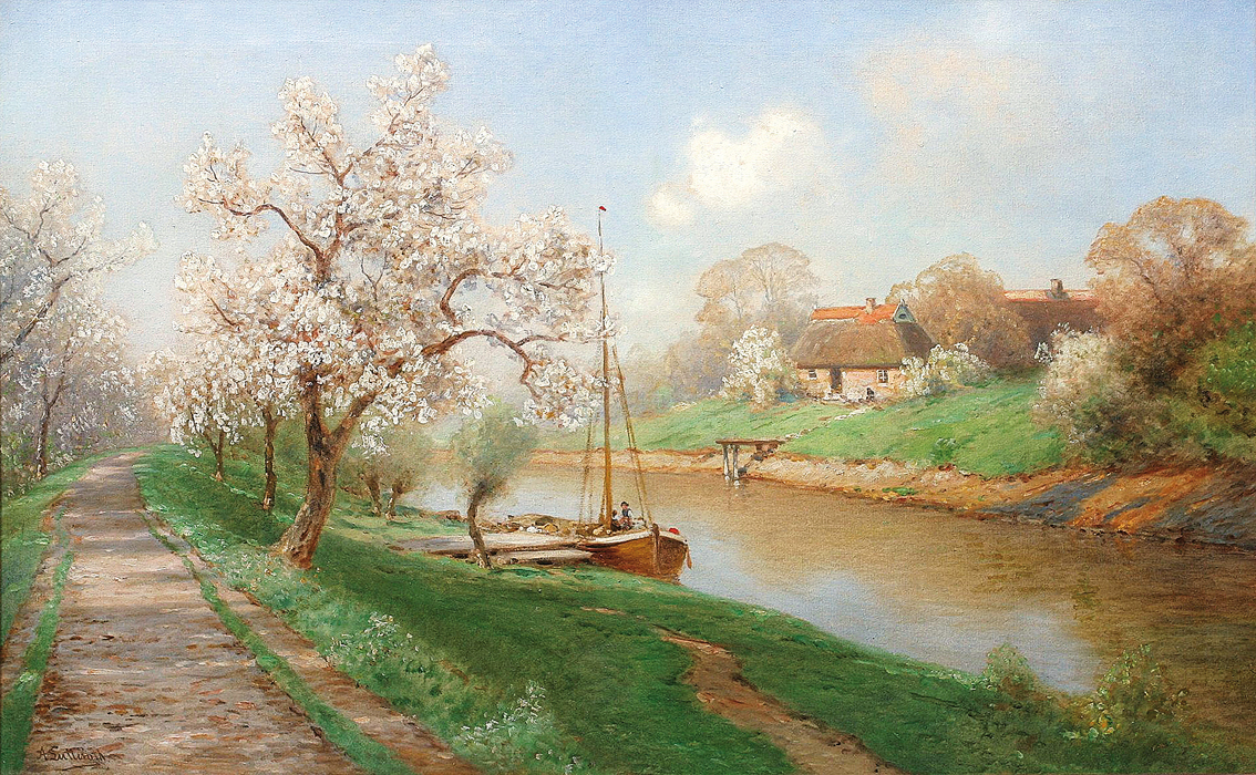 A river landscape with trees in blossom