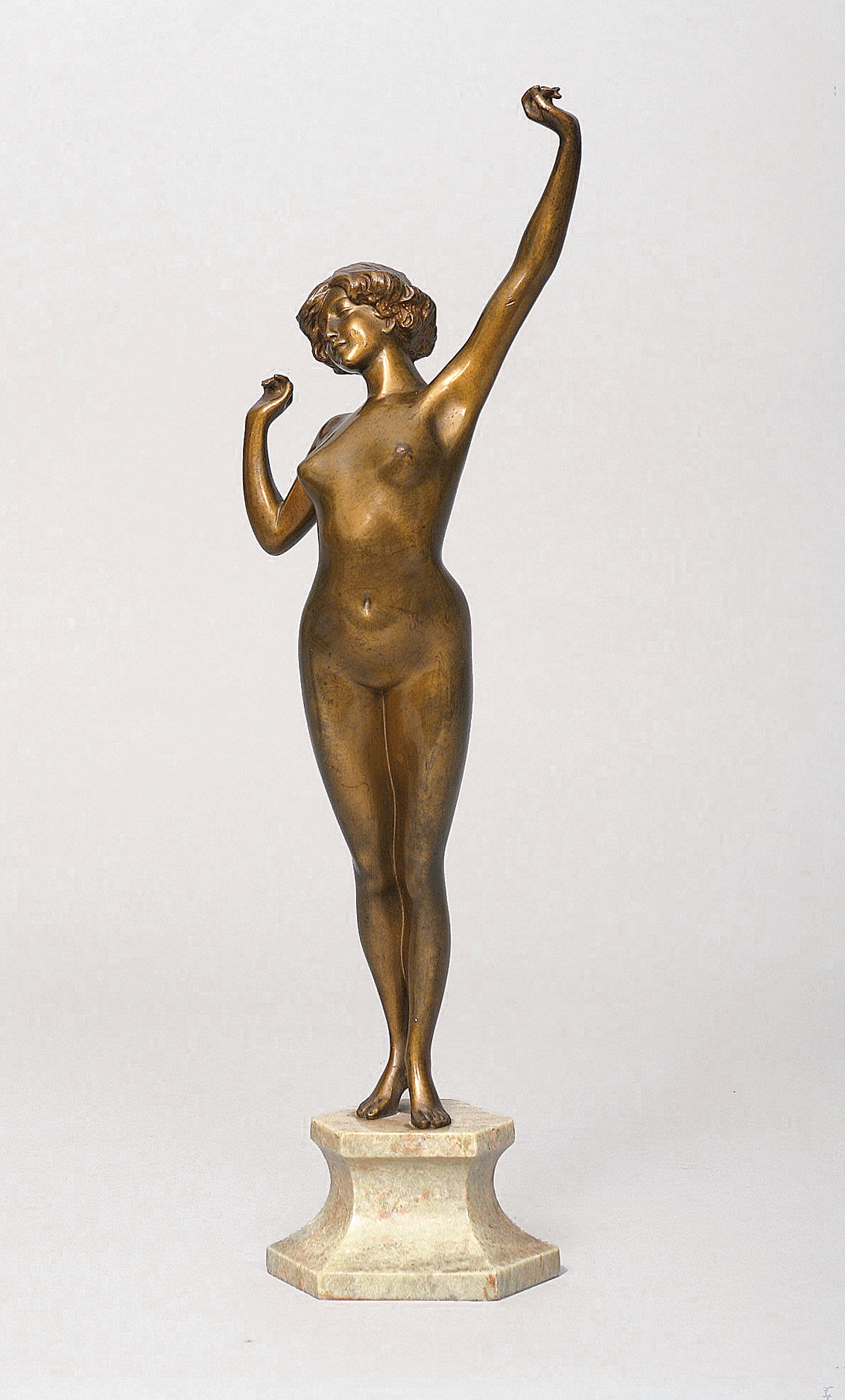A small bronze figure 'female nude'