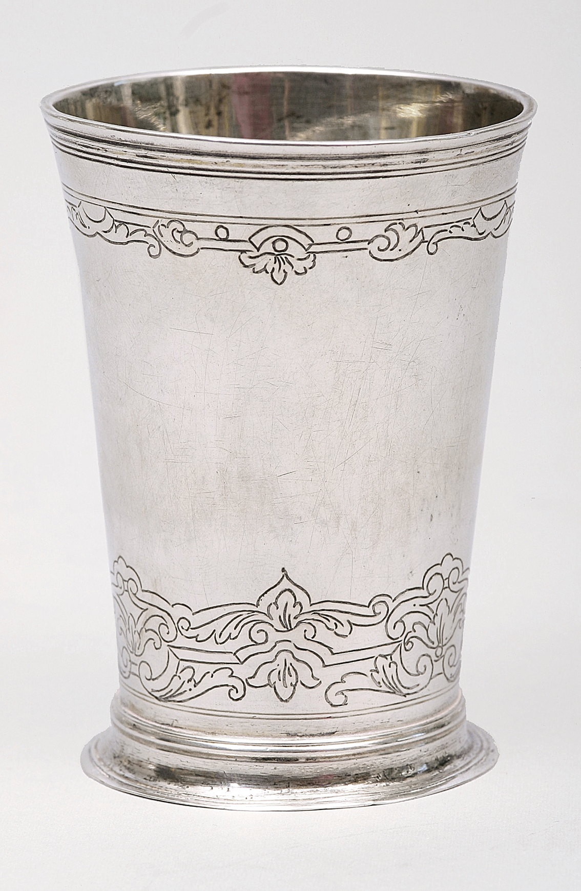 A small 'baroque' cup with fine engravings
