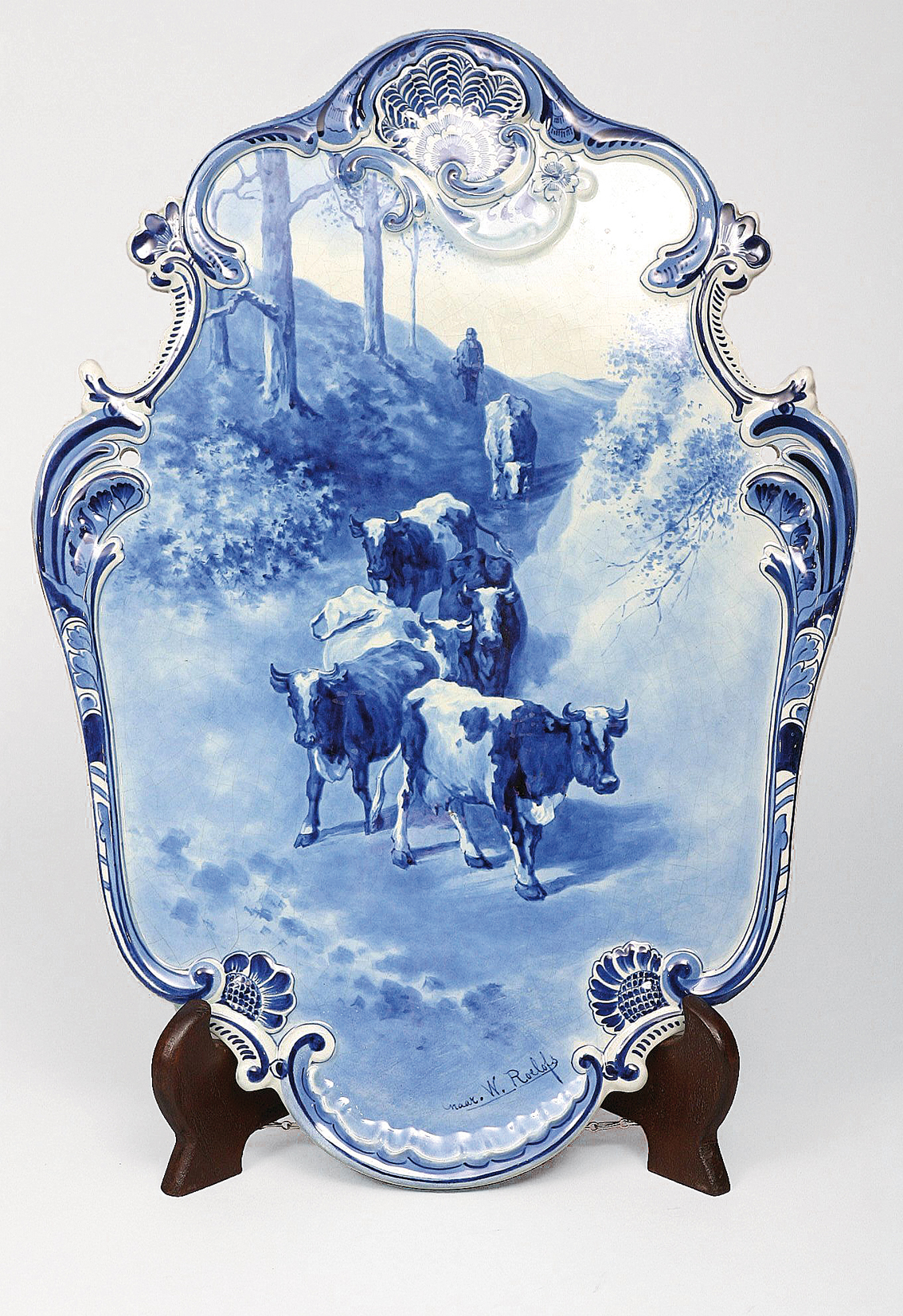 A large plate 'peasant with cows' in u'glaze blue