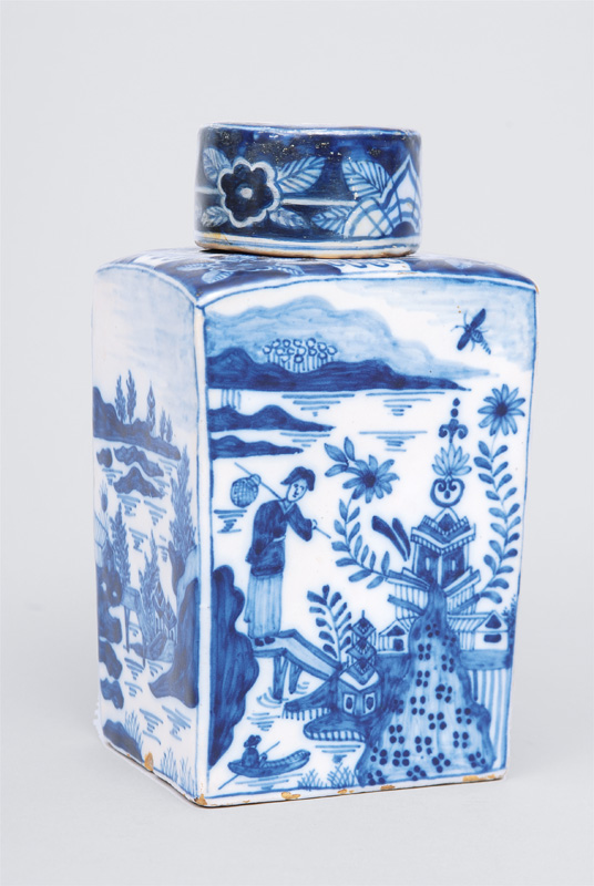 A tea caddy with chinese river landscape in blue
