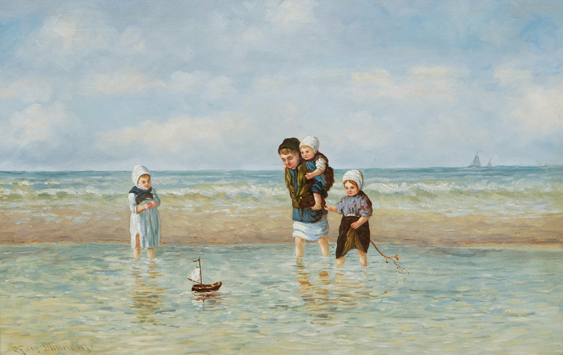 Children playing on the beach of the North Sea
