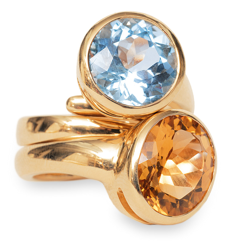 A pair of rings with topaz and citrine