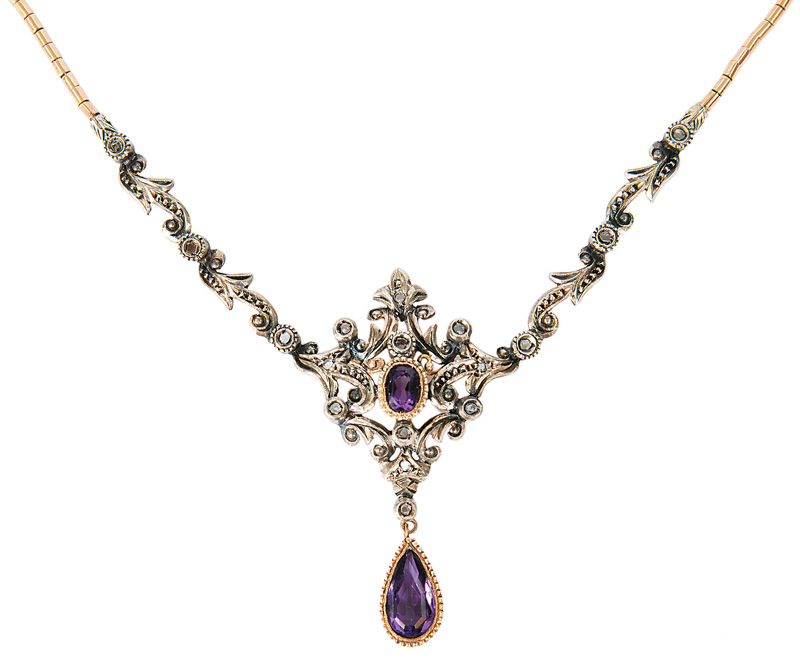 An antique amethyst necklace in the style of Hugo Schaper
