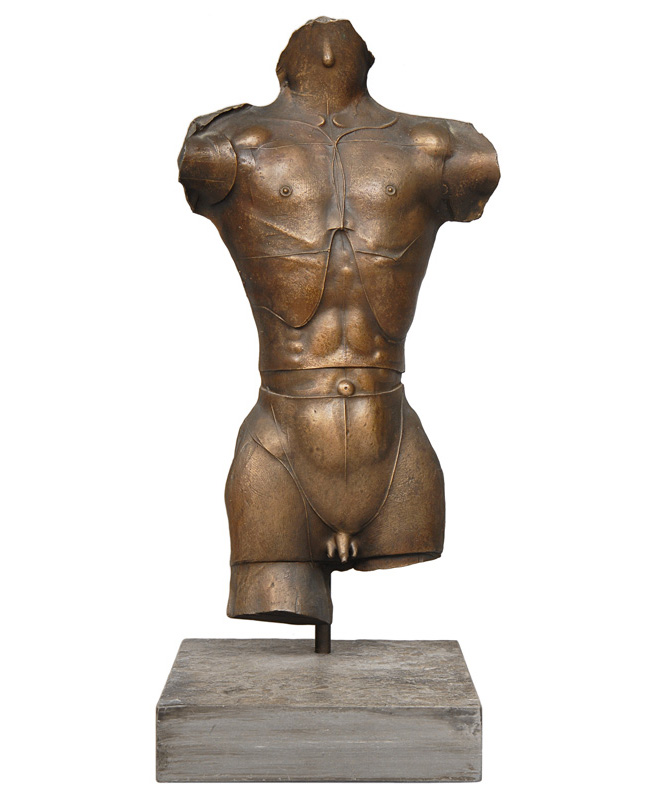 A bronze relief "Male torso with medaillon"