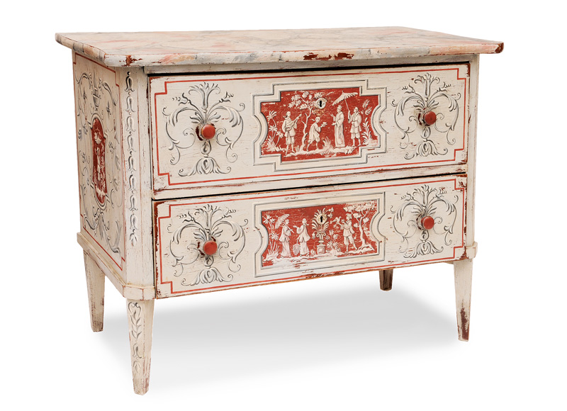 A coloured chest of drawers with chinoiserien