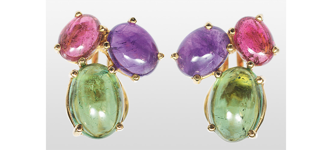 A pair of earrings with colour stones
