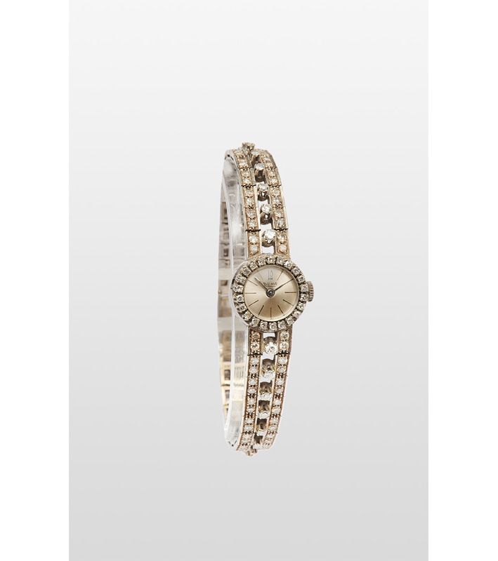 A ladies wrist watch with diamonds by Beha