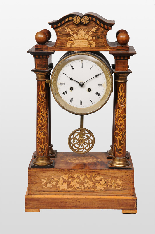 A mantle clock with marqueterie