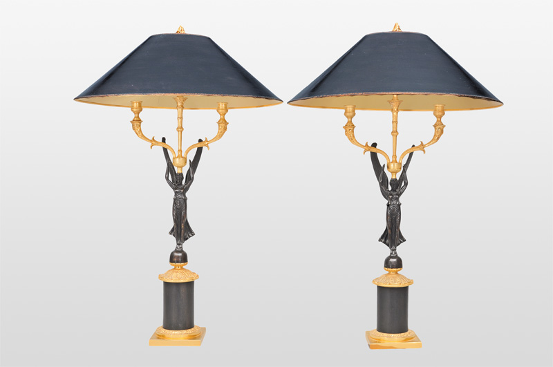 A pair of girandole lamps with Victoria figures in the style of Empier