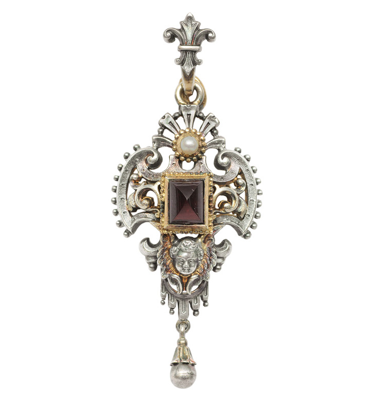 A pendant with garnets and putto ornament