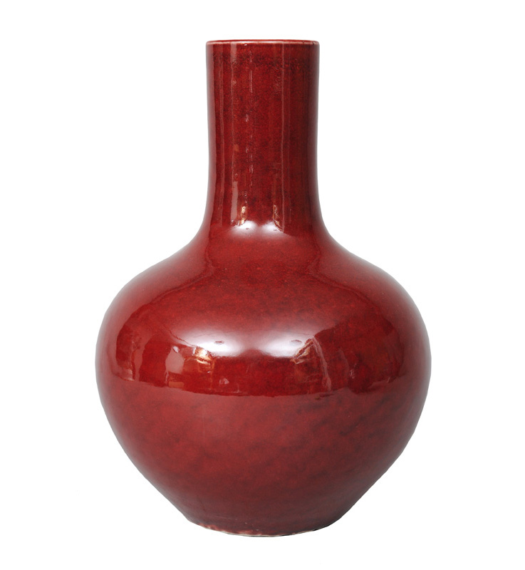 A tall "Sang-de-boeuf" globular bottle vase