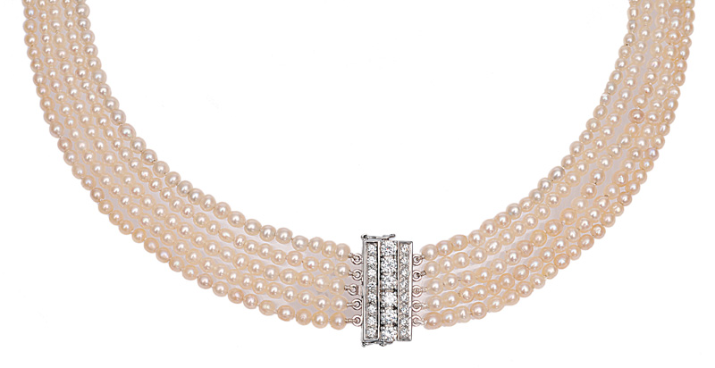 A natural pearl necklace with diamond clasp