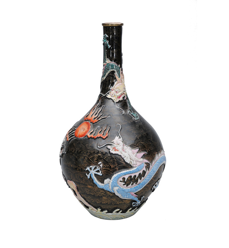 An unusual "Famille-Noire" bottle vase with dragon relief