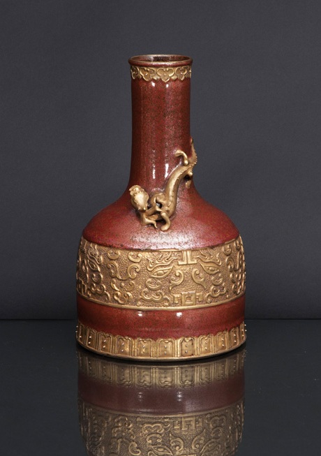 An unusual 'Peachbloom' Mallet vase with relief decoration