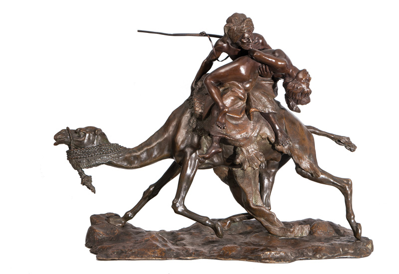 A large bronze figure 'Arab warrior abducting a woman'