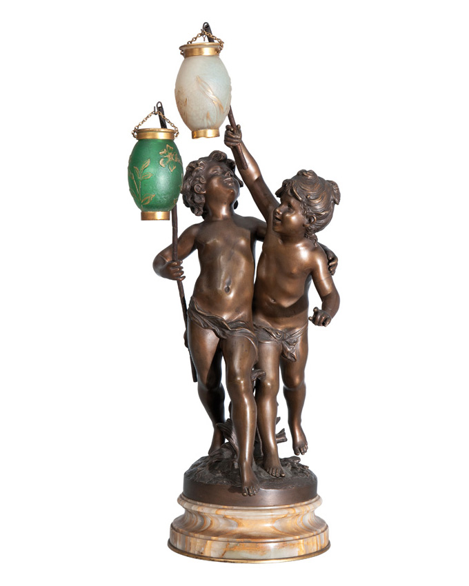 An extraordinary bronze figure with glass lamps of Daum Fréres