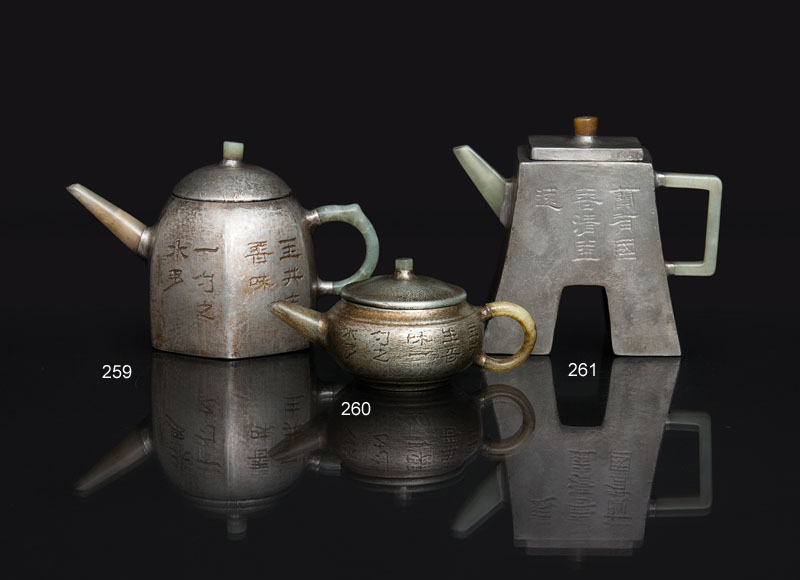An unusual pewter-encased Yixing teapot