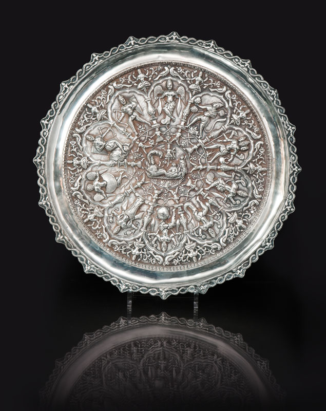 A large silver platter with Hinduistic relief