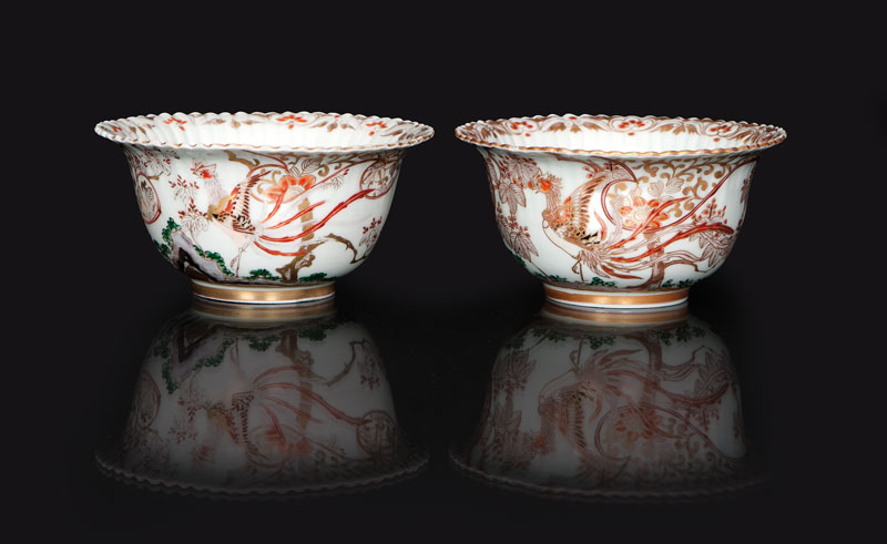 A pair of deep bowls with luck symbols