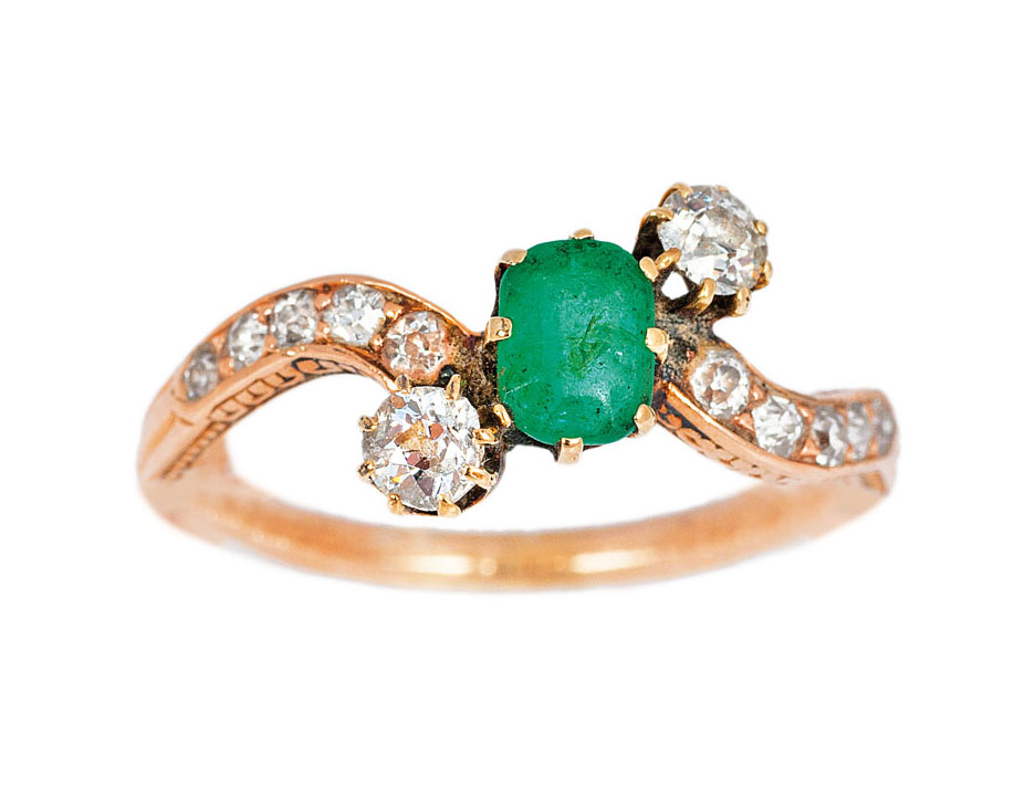 A petite emerald diamond ring
