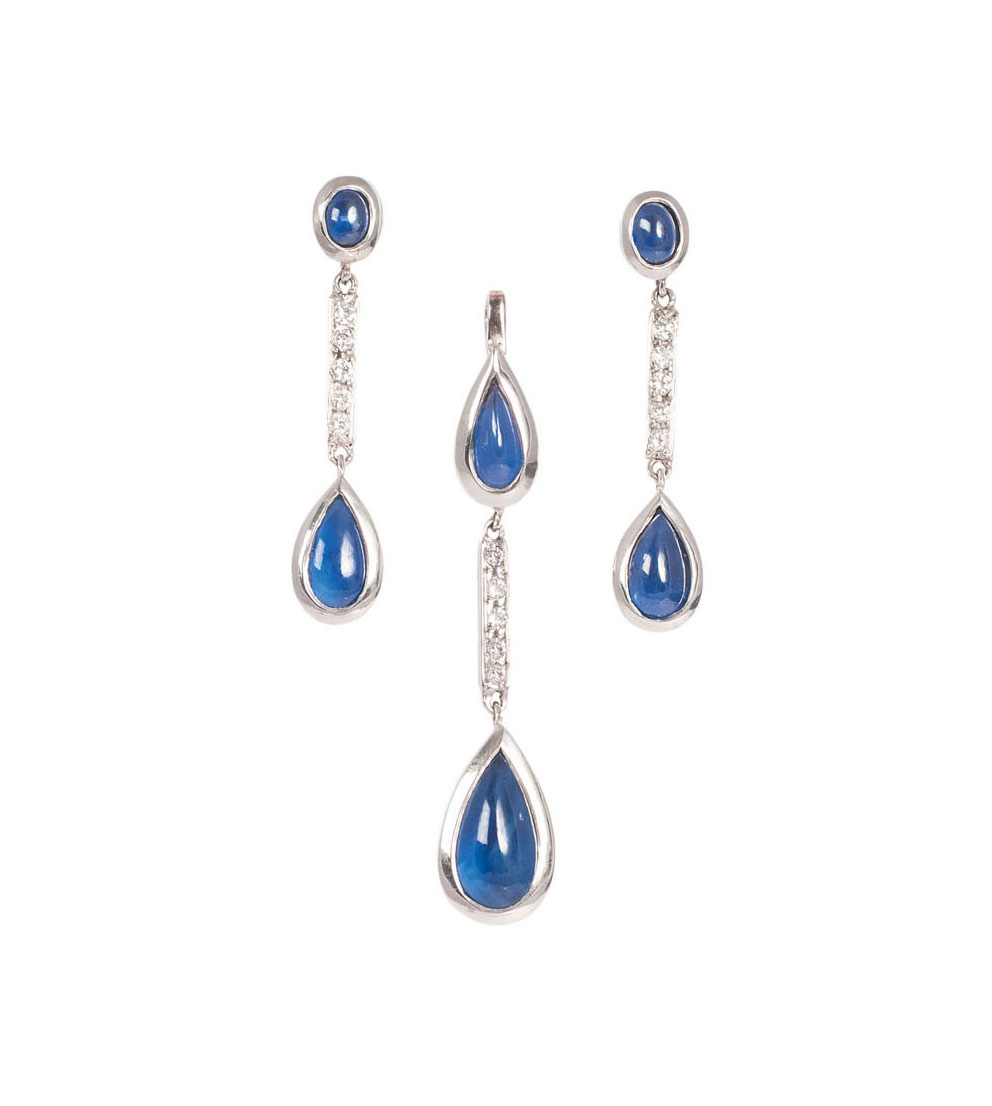 A sapphire diamond set with pendant and a pair of earrings