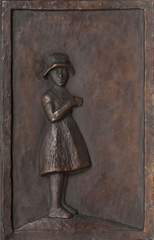 A bronze relief 'Young girl with hat'