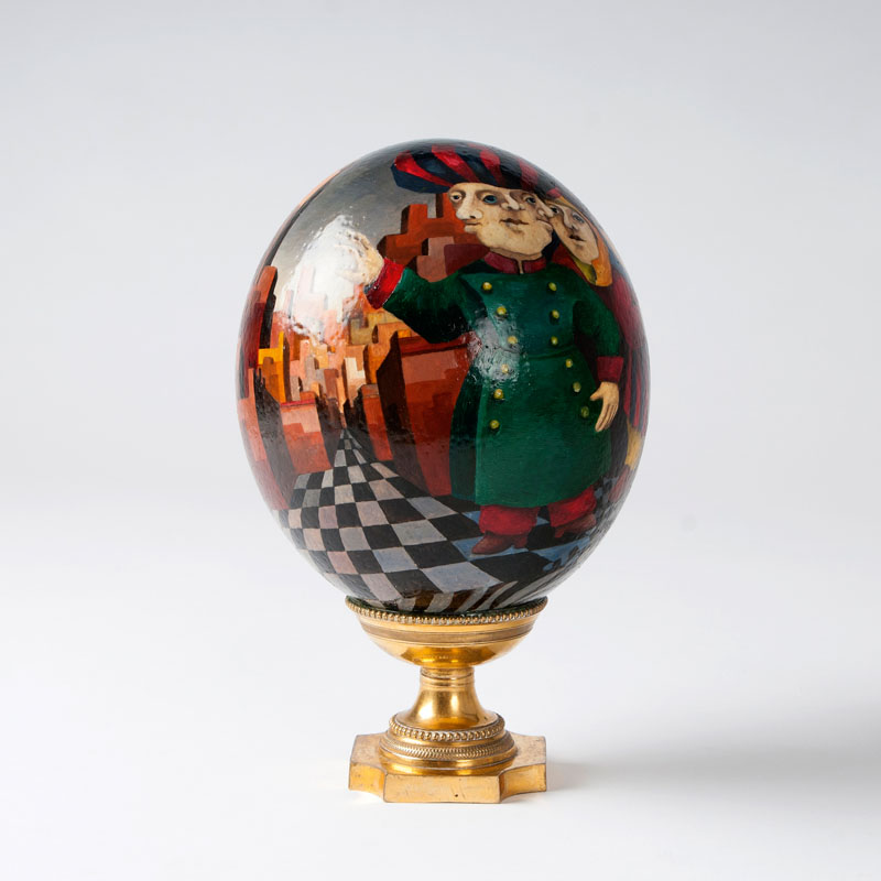 An ostrich egg with richly coloured big city scene