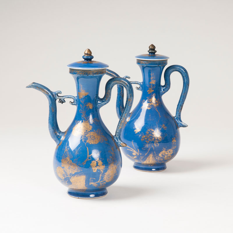 A pair of 'powderblue'-narrow-necked vases with fine gold decor