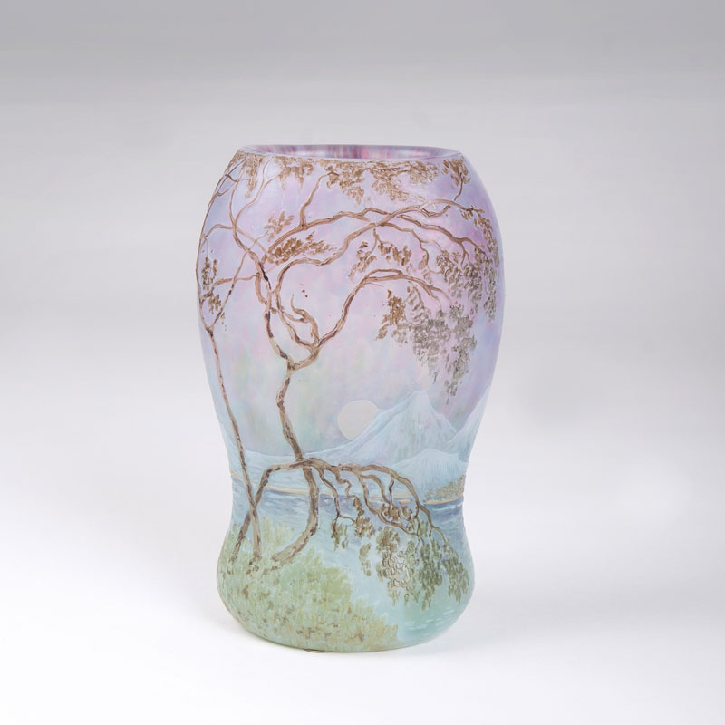 A small Perrier vase with a coast landscape