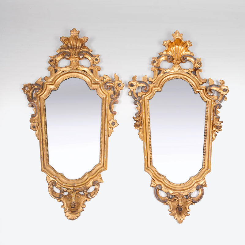 A pair of late-baroque mirrors 'au mascaron'
