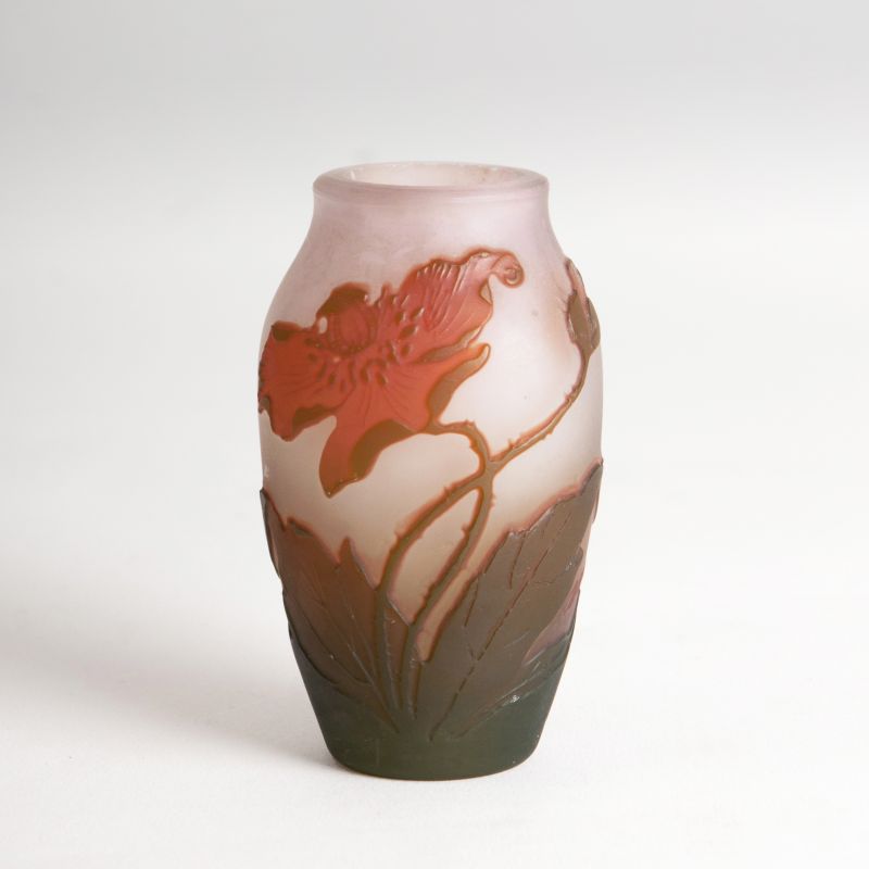 A miniature vase with poppies