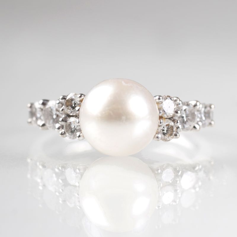 A pearl diamond ring