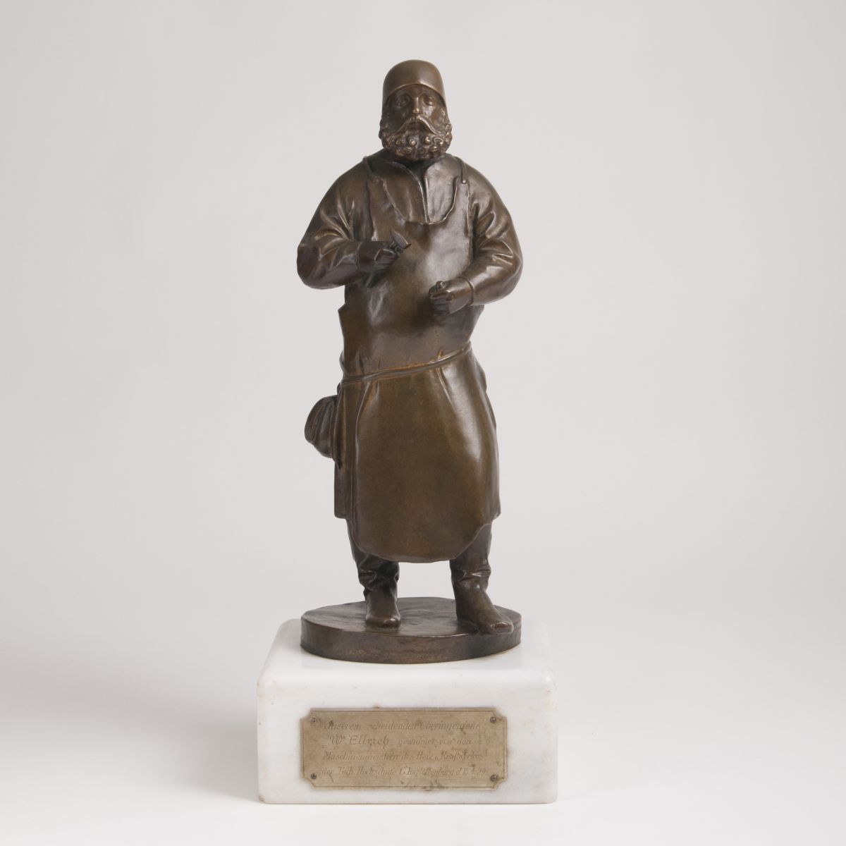 A bronze figure 'Hewer'