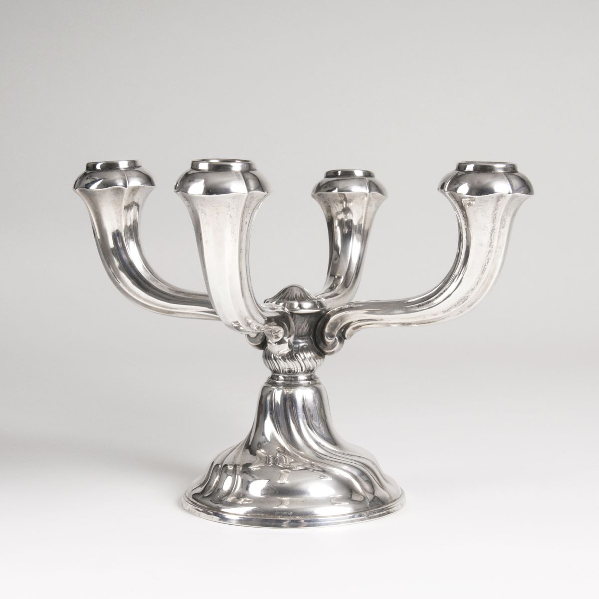 A small candle holder in baroque style
