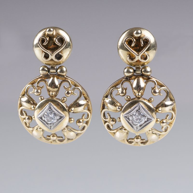 A pair of Vintage gold earpendants with small diamonds