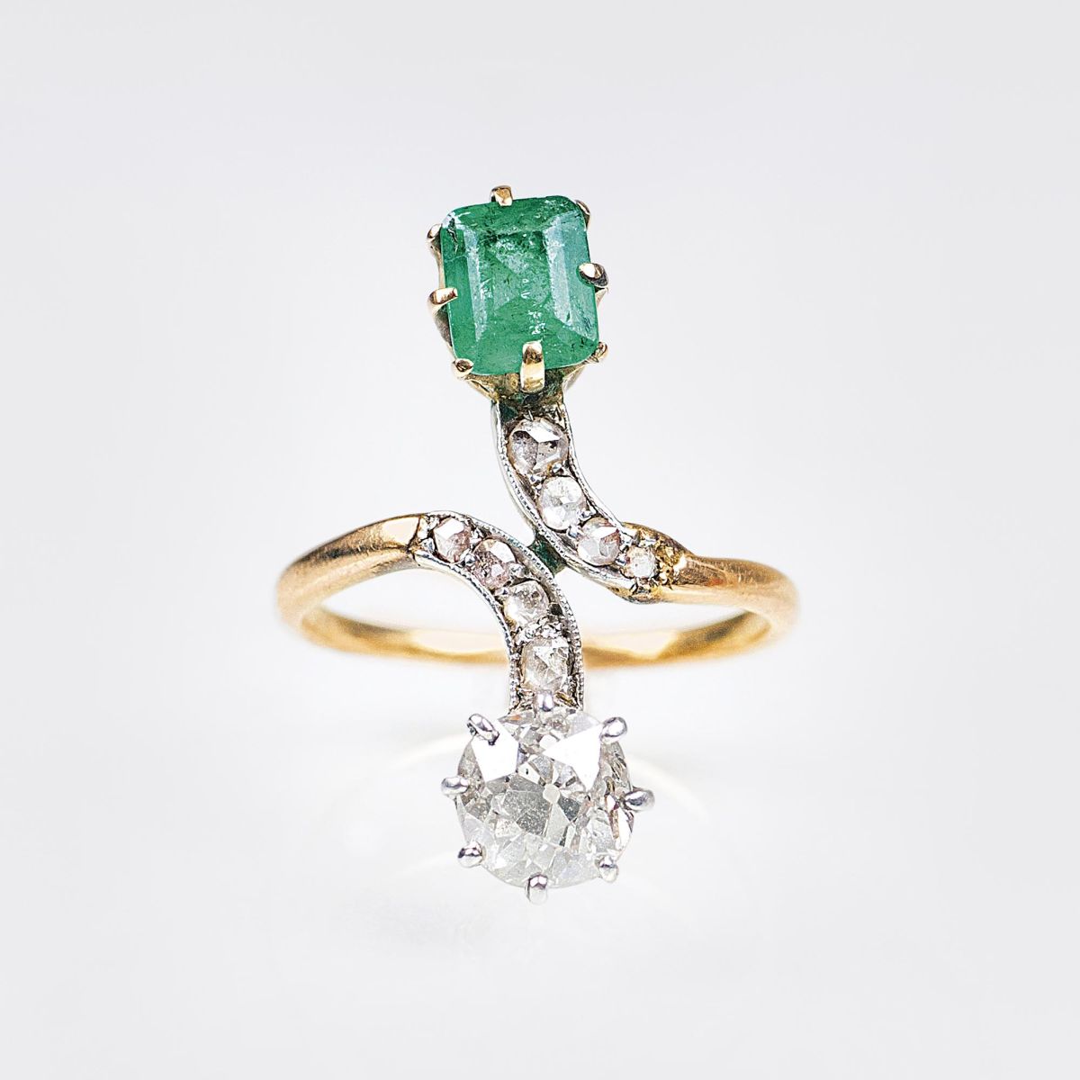 An Art Nouveau Diamond Emerald Ring