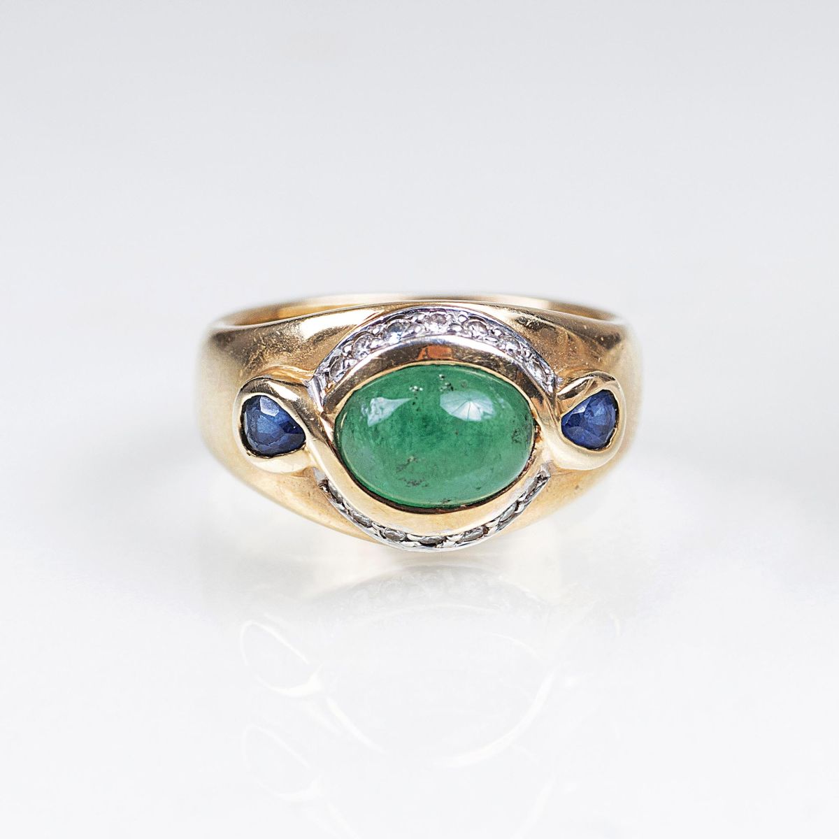 An Emerald Sapphire Diamond Ring