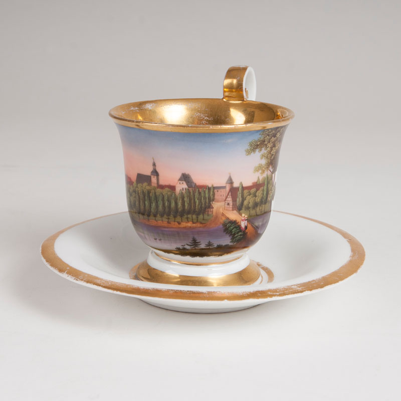 A porcelain bell beaker with a landscape view