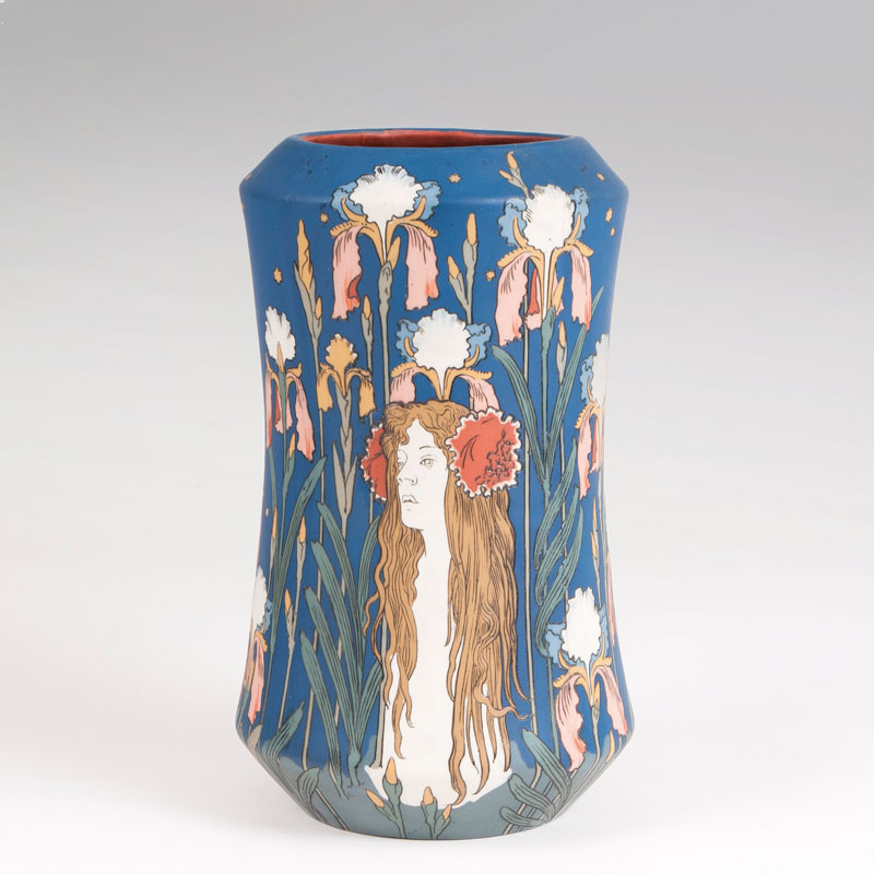A chromolith stoneware vase with female head