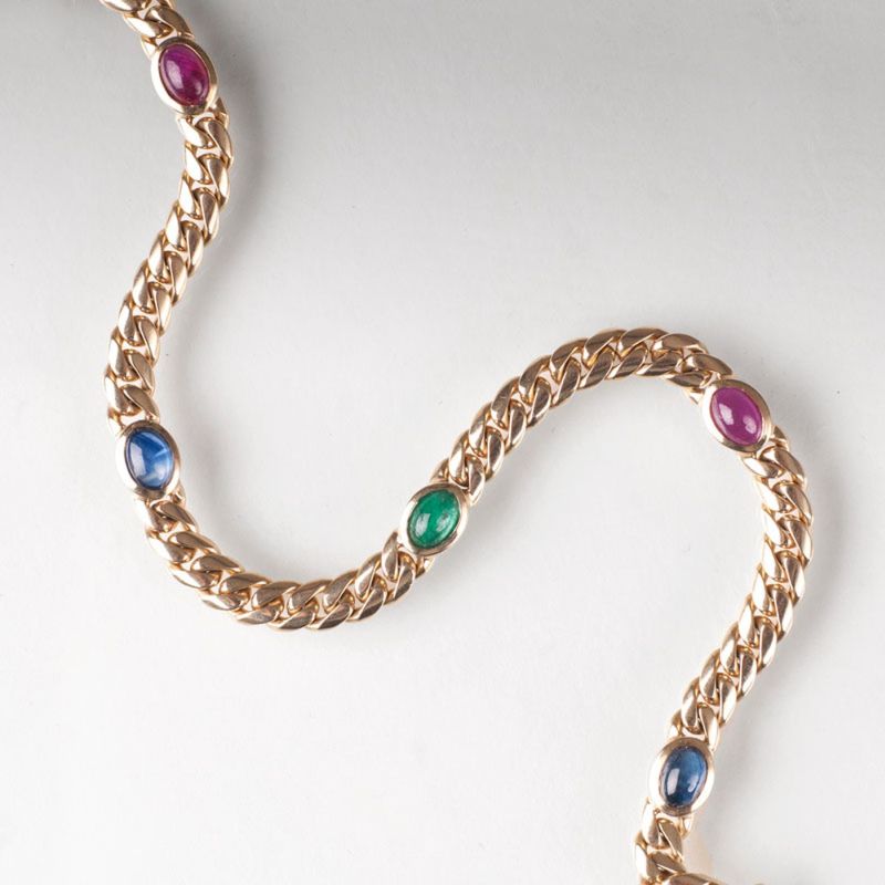 A curb chain bracelet with precious stones