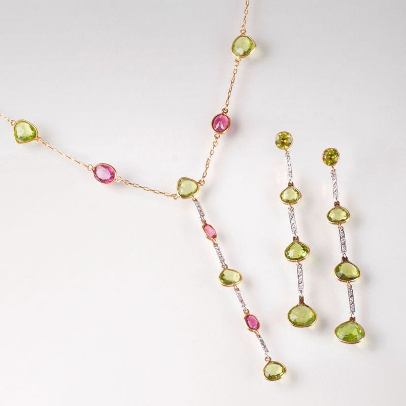 A tourmaline peridot diamond jewellery set with necklace and a pair of earrings