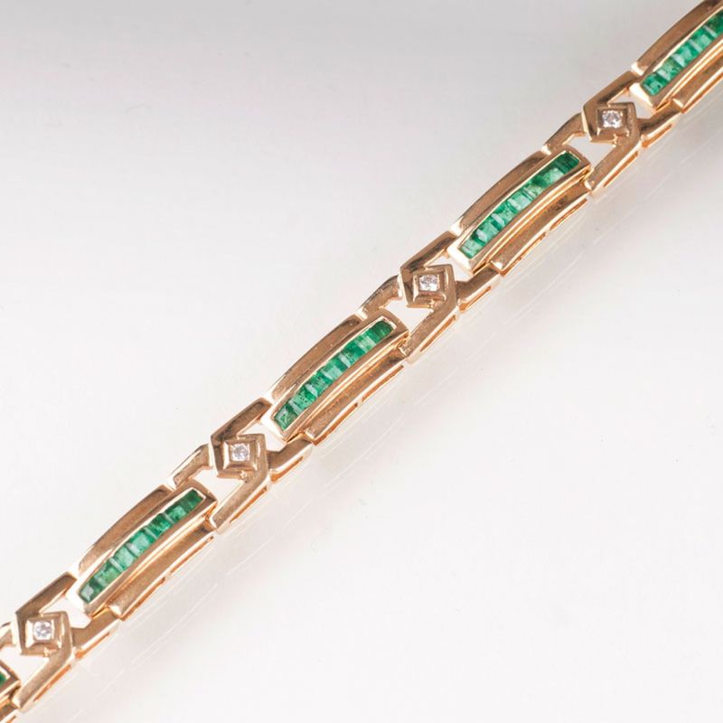A bracelet with diamonds and emeralds