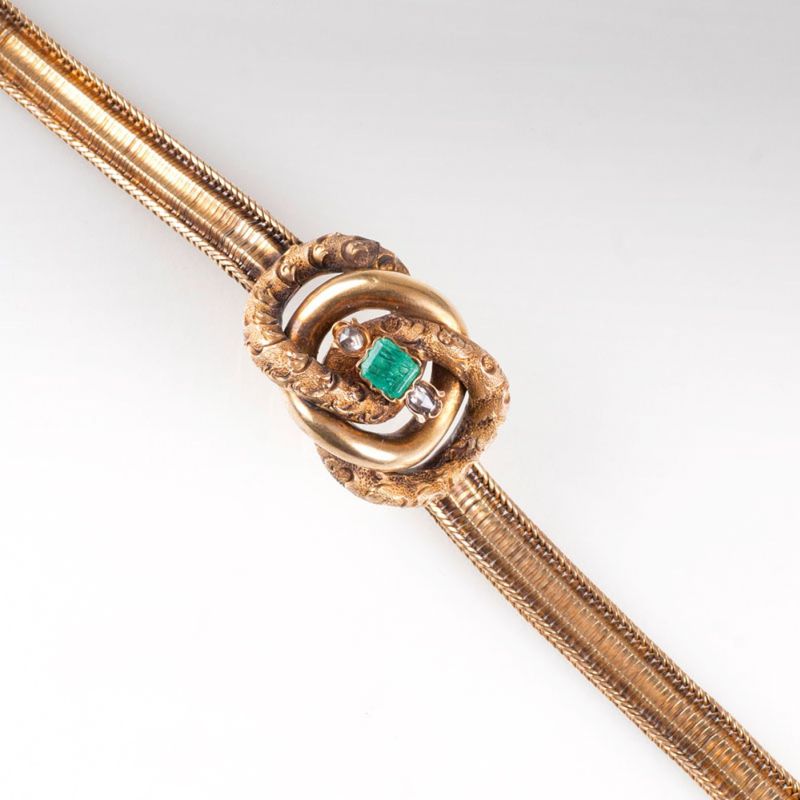 A Vintage golden bracelet with emeralds and diamonds