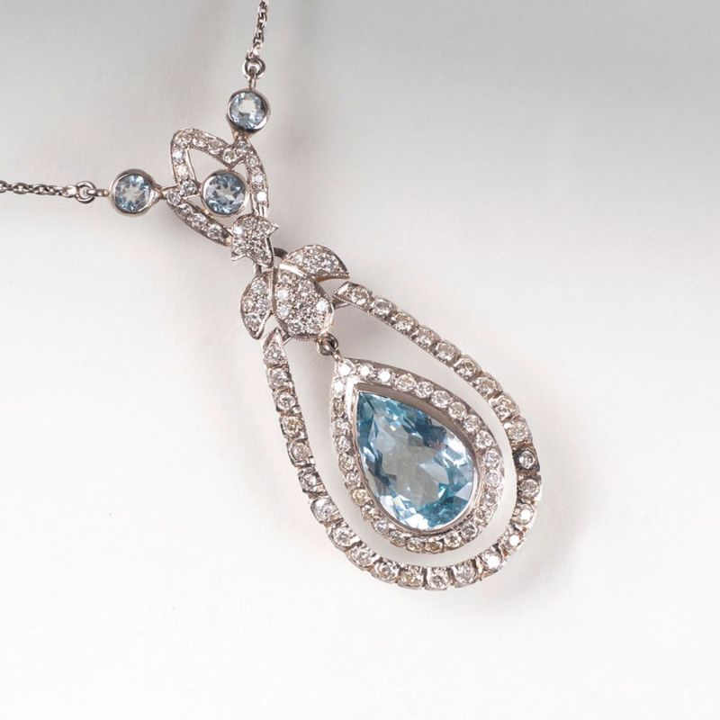 A aquamarine diamond necklace in the style of Art Nouveau