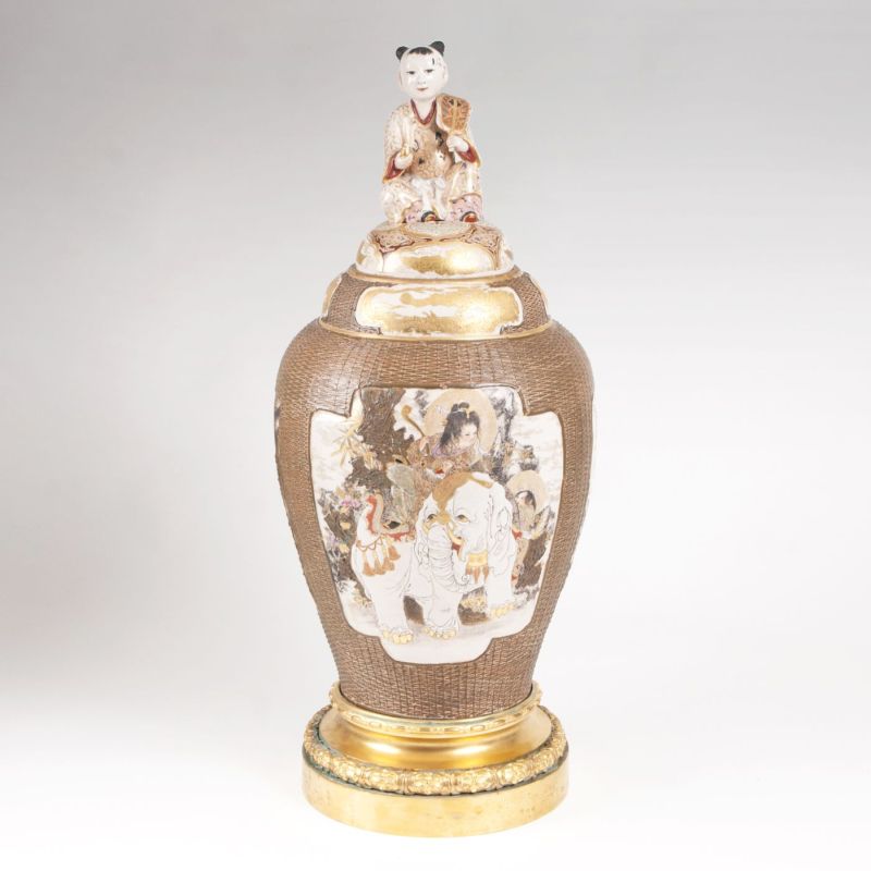 A magnificent Satsuma vase with cover and ormolu mount