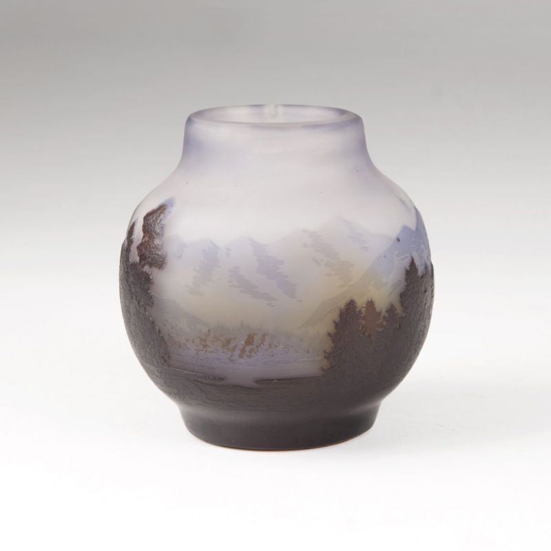 A small bellied Art Nouveau vase with mountain scenery