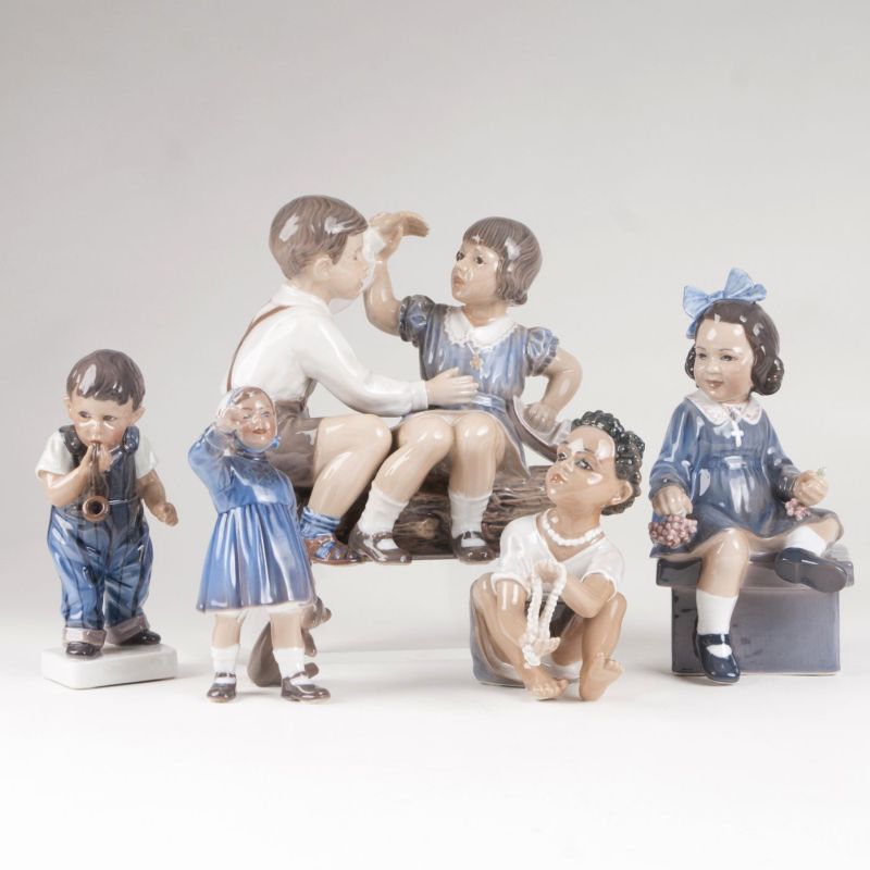 A set of 5 porcelain children figures