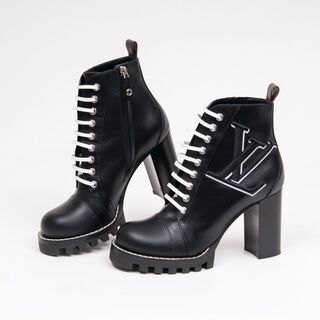 A Pair of Laced Star Trail Ankle Boots