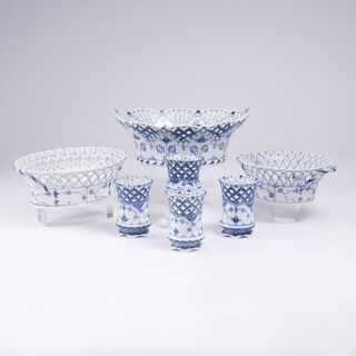 A Set of Royal Copenhagen 'Musselmalet' of Reticulated Baskets and Vases